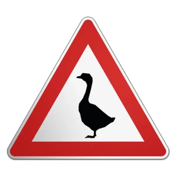 Dreieckiges Verkehrsschild mit Motiv Gans